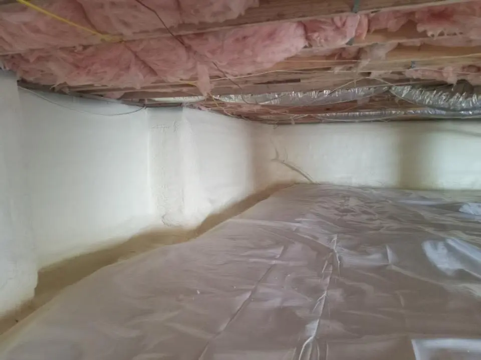 Crawl space encapsulation with closed-cell spray foam for Commercial Roof Restoration in Gibsonville